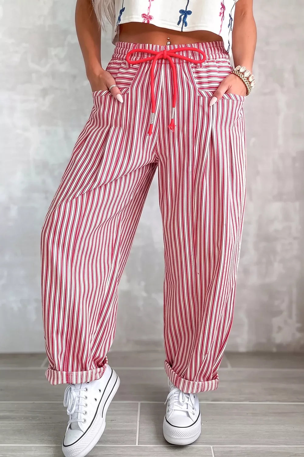 wide-leg pants in crimson red featuring drawstring waist and loose fit