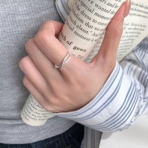 silver ring with twisted design and not applicable