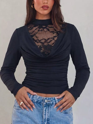 95% polyester, 5% elastane Care instructions: Machine wash cold blouse in black with fitted silhouette