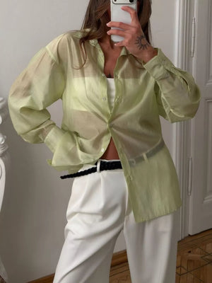 90% lysel, 10% polyester Care instructions: Machine wash cold button-up shirt in Gum Leaf with oversized silhouette