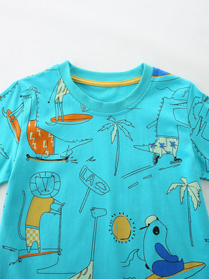 Aqua 100% cotton t-shirt with playful cartoon print of animals skateboarding and surfing.