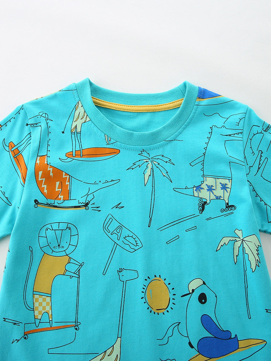 Aqua 100% cotton t-shirt with playful cartoon print of animals skateboarding and surfing.
