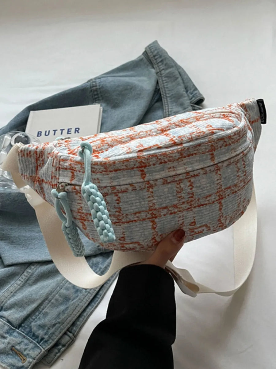 Textured tweed belt bag in pink with braided pulls and white strap