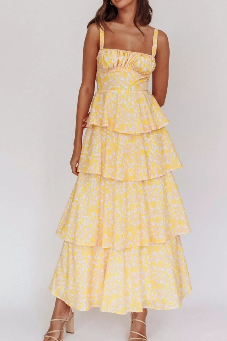 Yellow floral print tiered maxi dress with square neckline and spaghetti straps