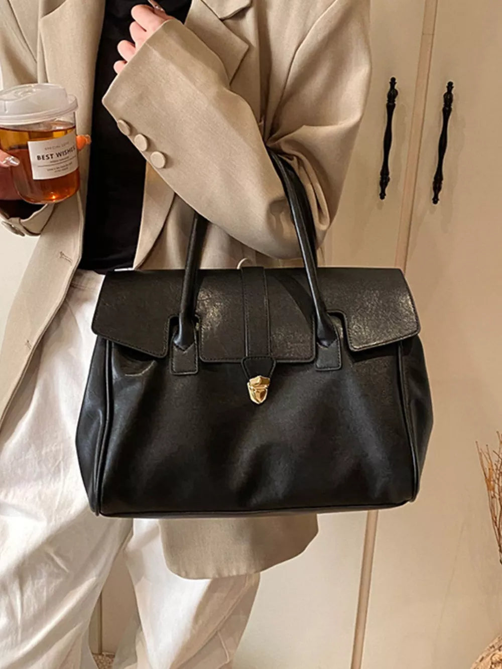 Black pu leather tote bag with gold buckle detail