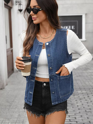 Blue denim vest with button-down front, collarless neckline, and chest and hip pockets.