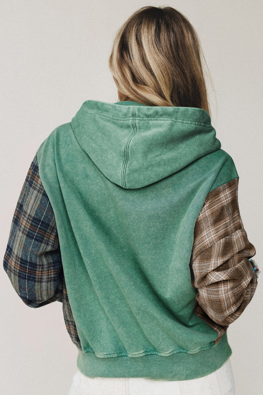 brown pullover hoodie featuring drawstring and plaid