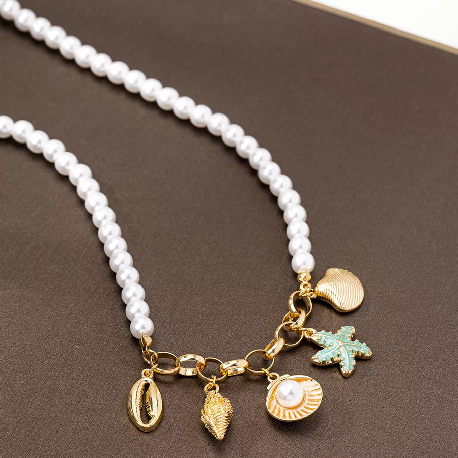 Synthetic Pearl, 18K Gold-Plated, Alloy Care instructions: While wearing the pea necklace in gold with straight silhouette