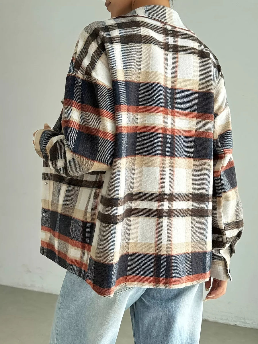 Relaxed fit plaid shirt jacket in mocha with button front and classic collar.