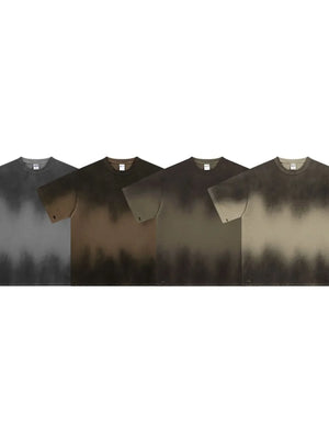 Faded ombre oversized tee in dark gray, army green, khaki, and taupe with a soft, washed look.