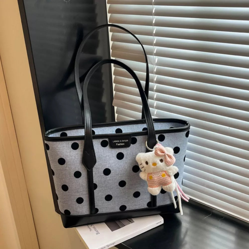 handbag in light gray featuring top handles and boxy fit