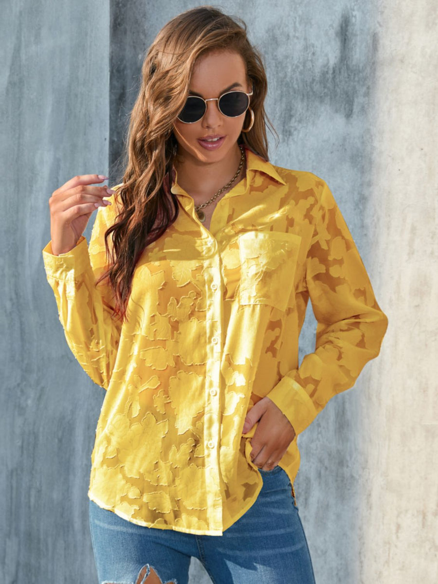 Yellow sheer button-down blouse with floral embroidery and two chest pockets.