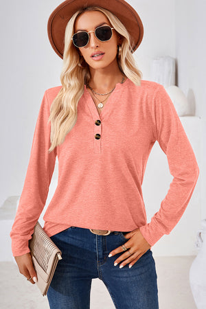 Henley button-down knit top in watermelon pink with a v-neck and long sleeves.