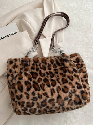 Leopard print faux fur tote bag with brown leatherette and chain handles.