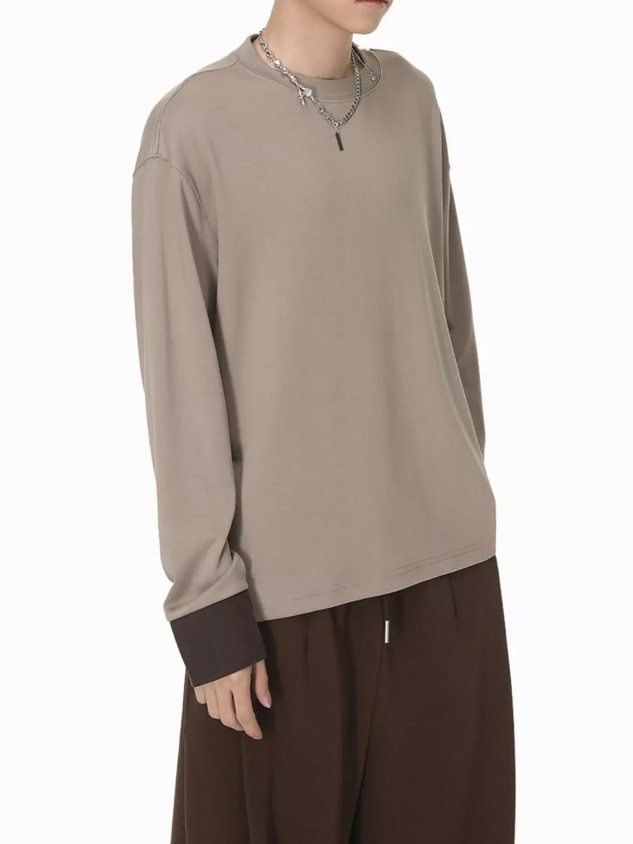 Relaxed fit long sleeve t-shirt in coffee color with contrasting dark brown cuffs.