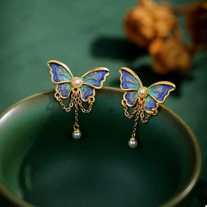 18K gold-plated butterfly earrings in cerulean with pearl drop charms and chains