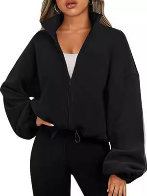windbreaker in black featuring zipper and relaxed fit