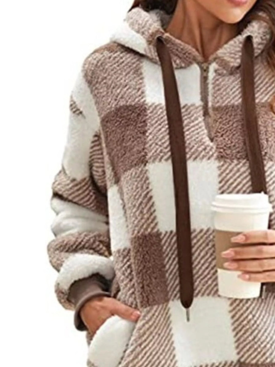 Brown and white plaid sherpa hoodie with drawstring and quarter zip.
