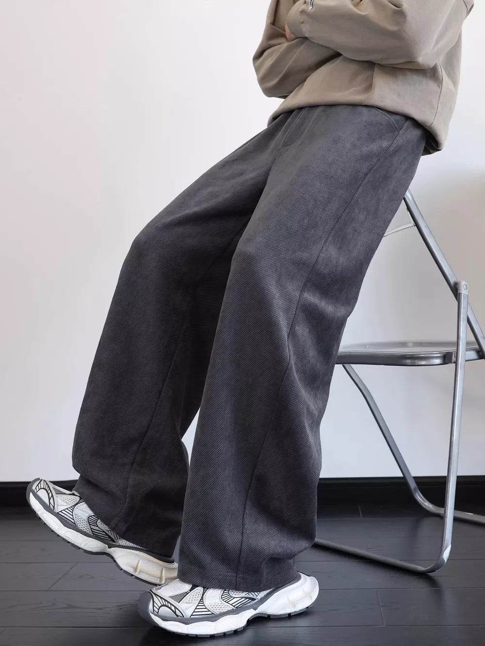 Men's dark gray vintage washed wide leg sweatpants with textured fabric.