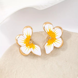 18K gold-plated butterfly stud earrings with white and yellow enamel details.