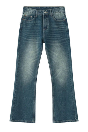Relaxed flare denim trousers in light blue wash with faded details and a casual fit.