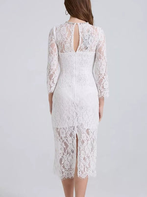 White lace midi dress with sheer sleeves, keyhole back, and a slit hem.