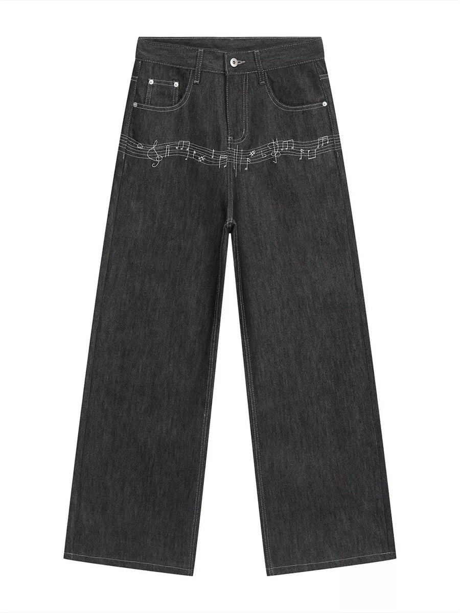 Loose fit dark wash cotton jeans with white embroidered musical notes across the front.