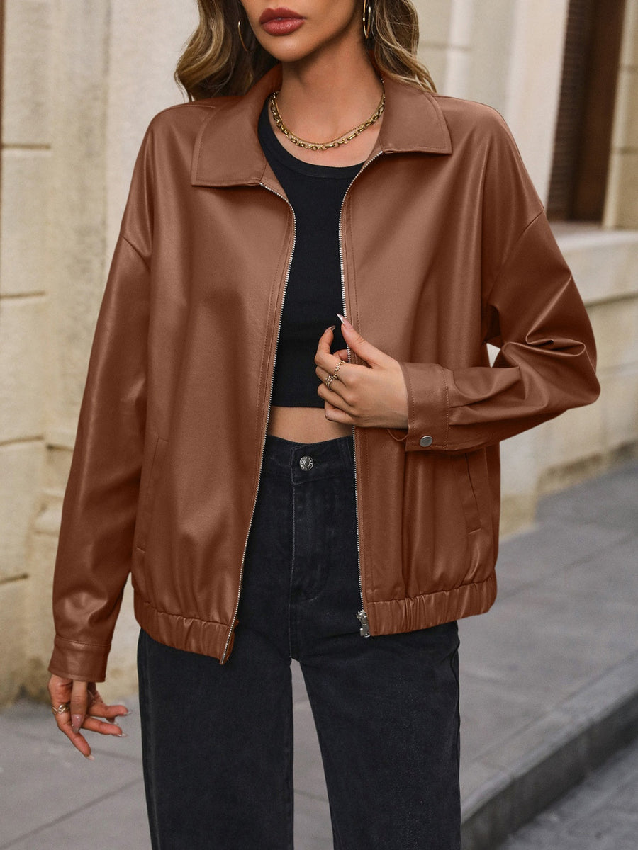 Brown faux leather bomber jacket with zip front and elastic cuffs