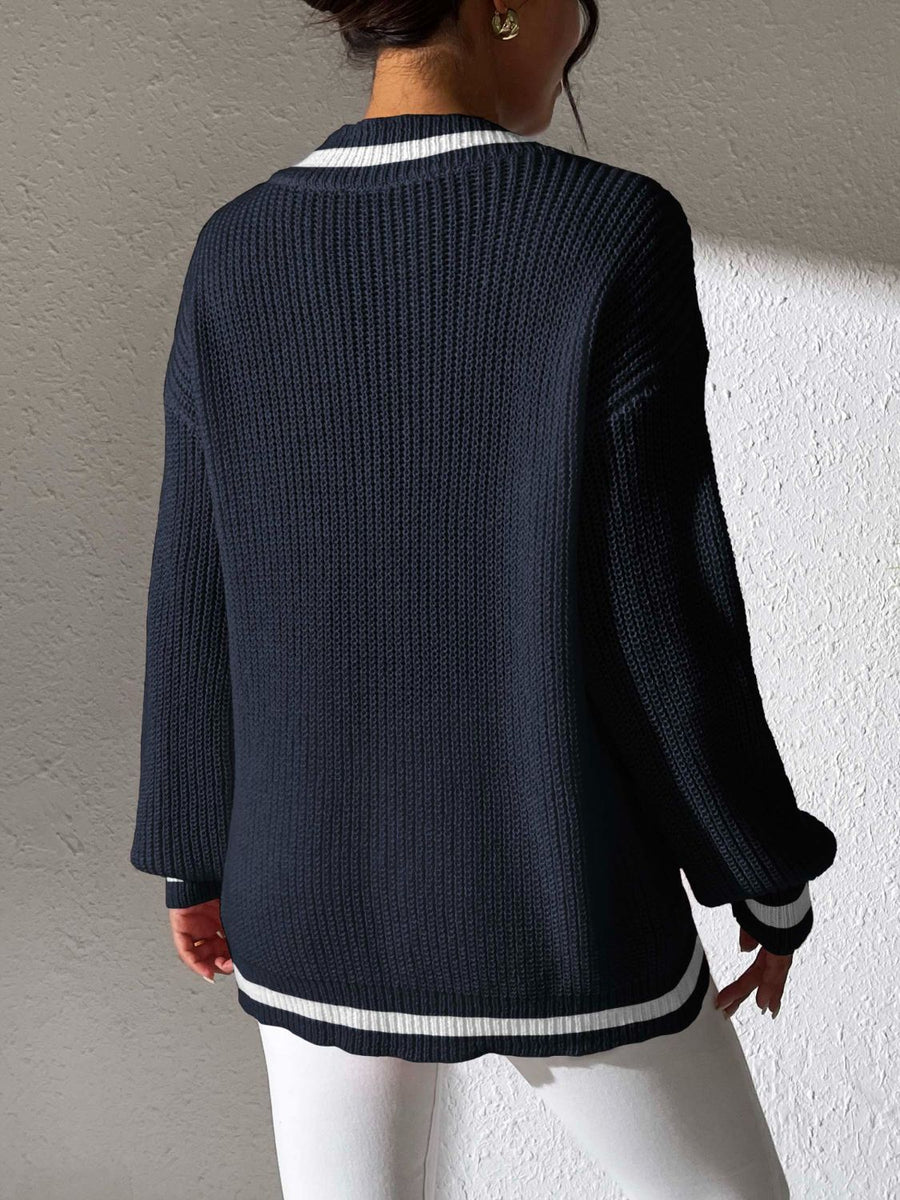 Dark Navy ribbed knit sweater with white varsity trim on neckline and hem.