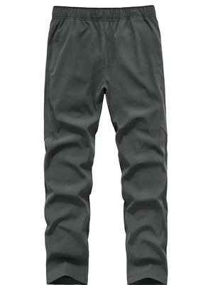 Men's grey sweatpants with elastic waistband and pockets.