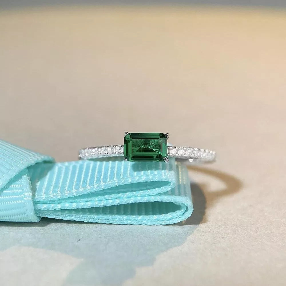 deep green ring with geometric and none