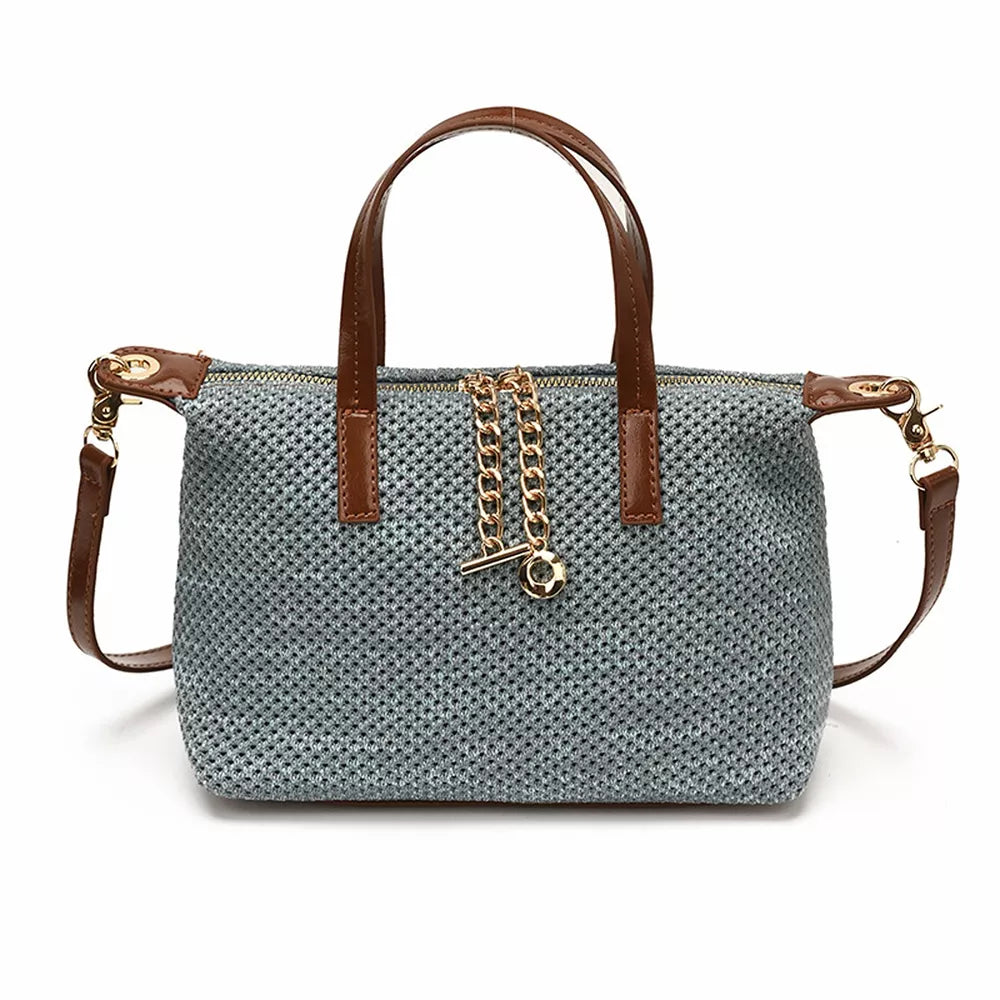 Woven Crossbody Bag With Leather Accents in Blue with woven texture