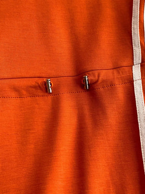 Orange casual dress with drawstring detail and white side stripe.