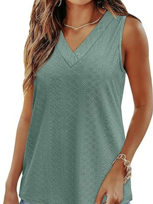 Sleeveless V-neck tank top in dusty pink with eyelet detail and textured pattern.