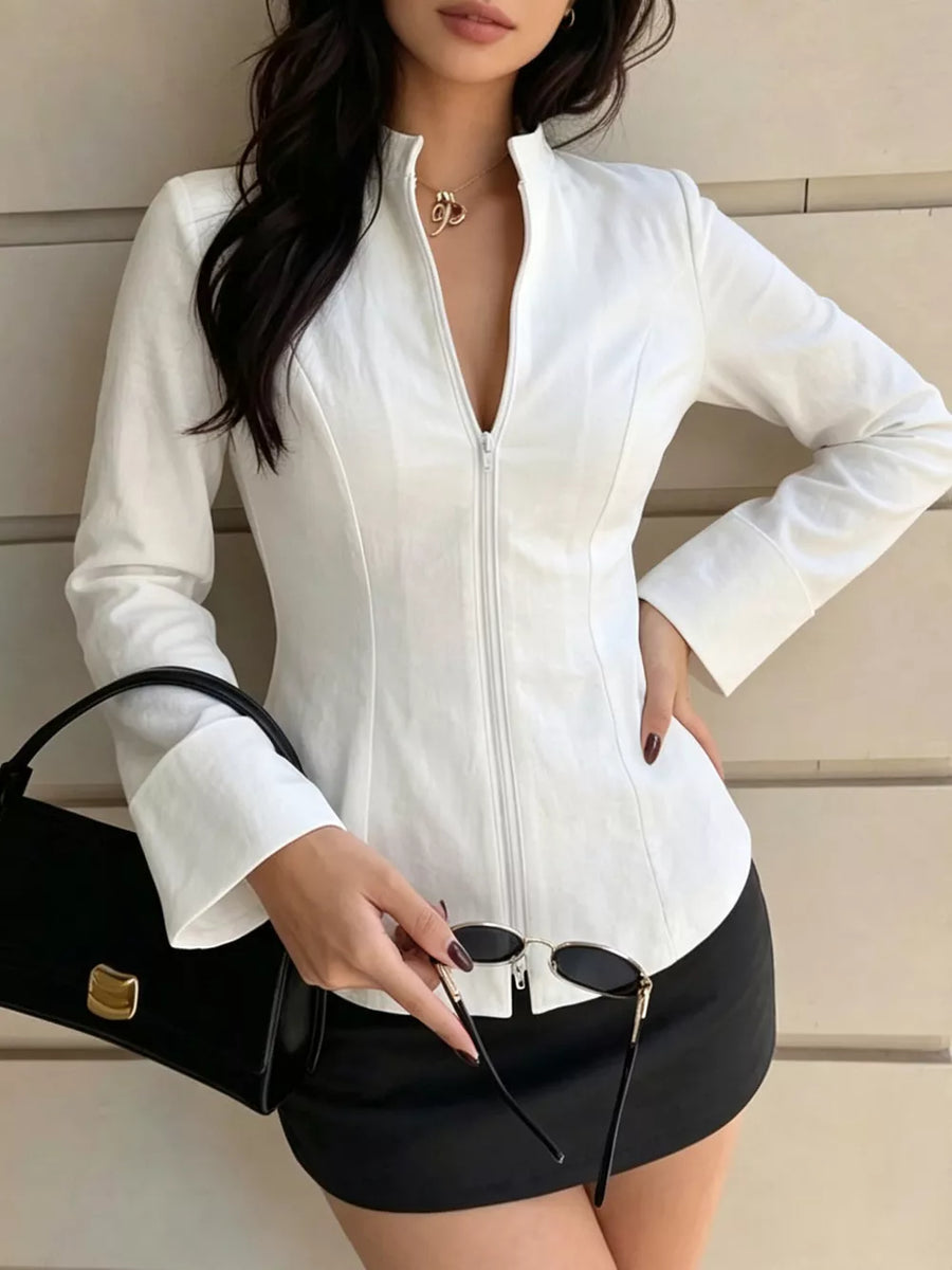 100% polyester Care instructions: Machine wash cold blouse in white with fitted silhouette
