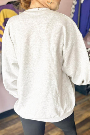 light gray cardigan with zipper and long sleeve