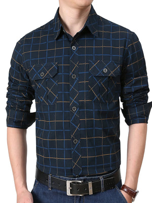 Plus-size casual long-sleeve shirt in black blue plaid with buttoned pockets and cuffs.