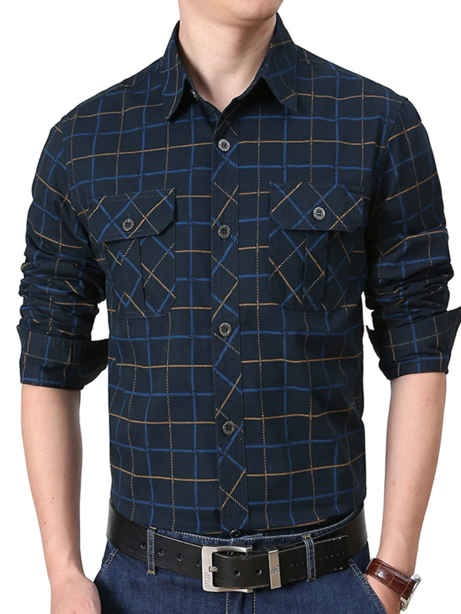 Plus-size casual long-sleeve shirt in black blue plaid with buttoned pockets and cuffs.