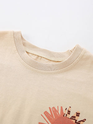 Toddler graphic tee in beige cotton with a sun print and crew neck detail.