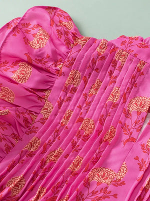 Pink floral print blouse with pleated front and flutter sleeves