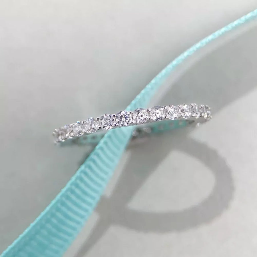 925 sterling silver,Zircon Care instructions: Avoid wearing during exercise, as ring in clear with band silhouette