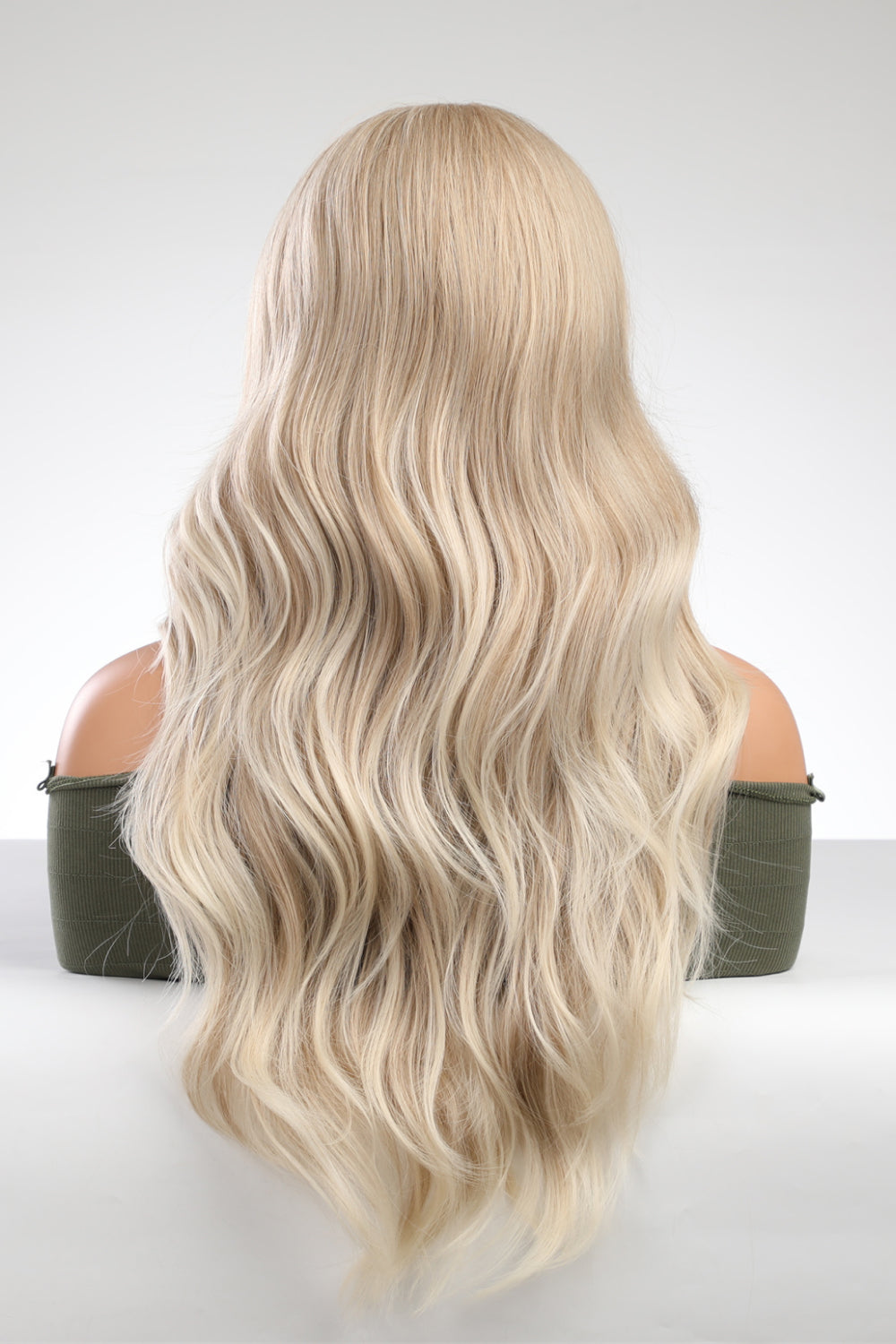 Blonde lace front wig with loose beachy waves and a comfortable cap.
