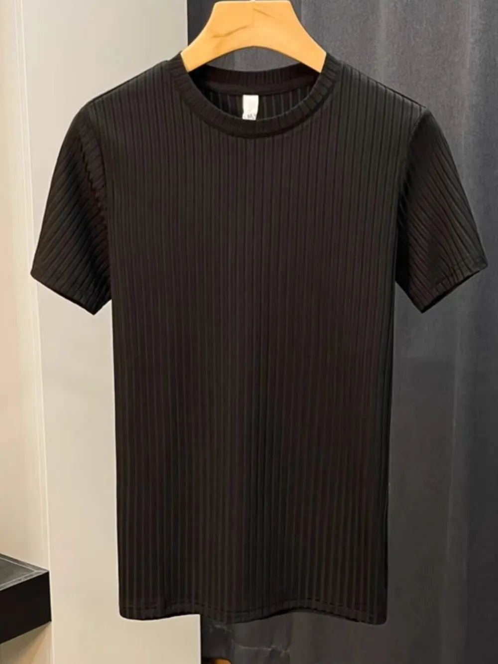 Black ribbed knit t-shirt for men, short sleeves, crew neck, cotton blend.