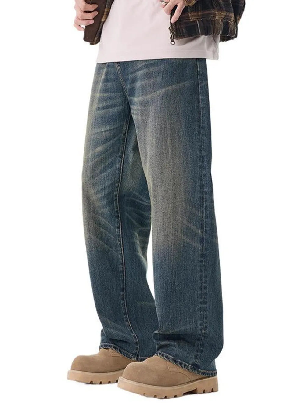 Men's relaxed fit wide-leg jeans in washed blue denim with a worn look.