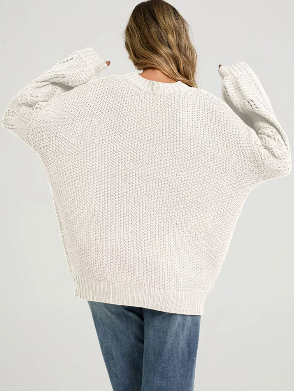pullover sweater in Black with ribbed and hip-length