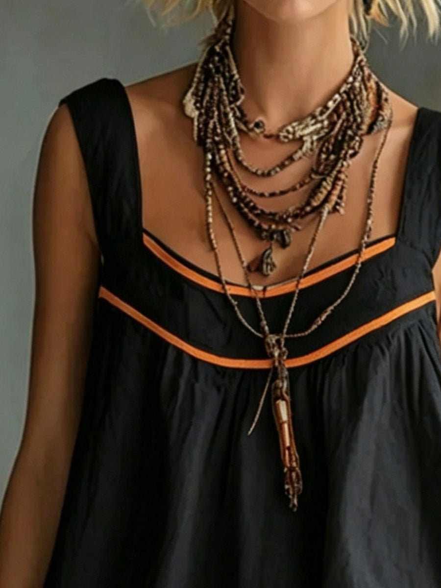 100% polyester Care instructions: Machine wash cold mini dress in Black with A-line silhouette