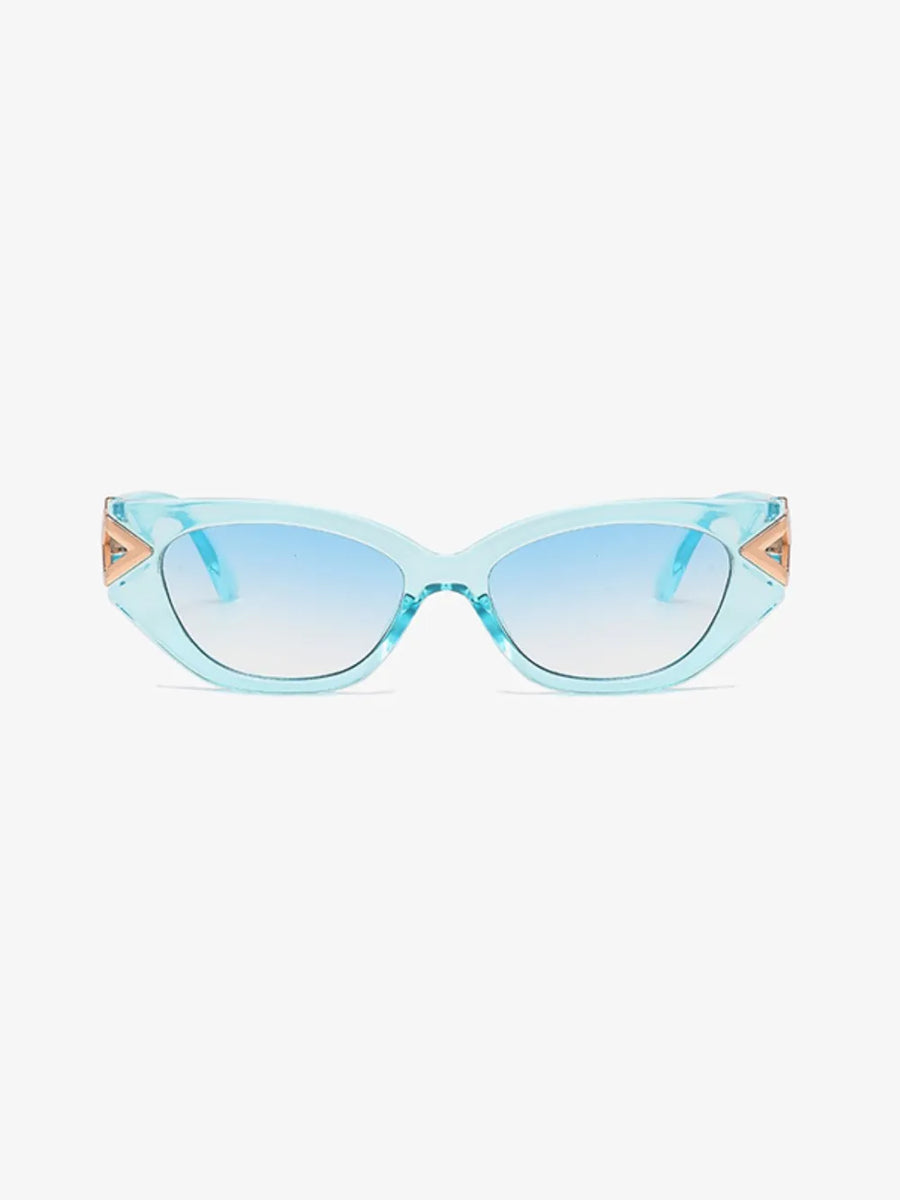 Mint blue cat-eye sunglasses with gold geometric accents and gradient lenses.