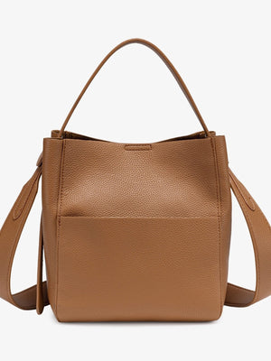 crossbody bag in black with textured and medium