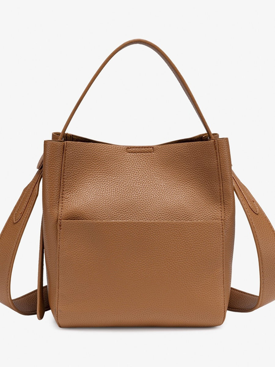 crossbody bag in black with textured and medium