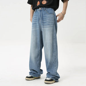 Oversized baggy denim jeans in medium wash with a relaxed fit.